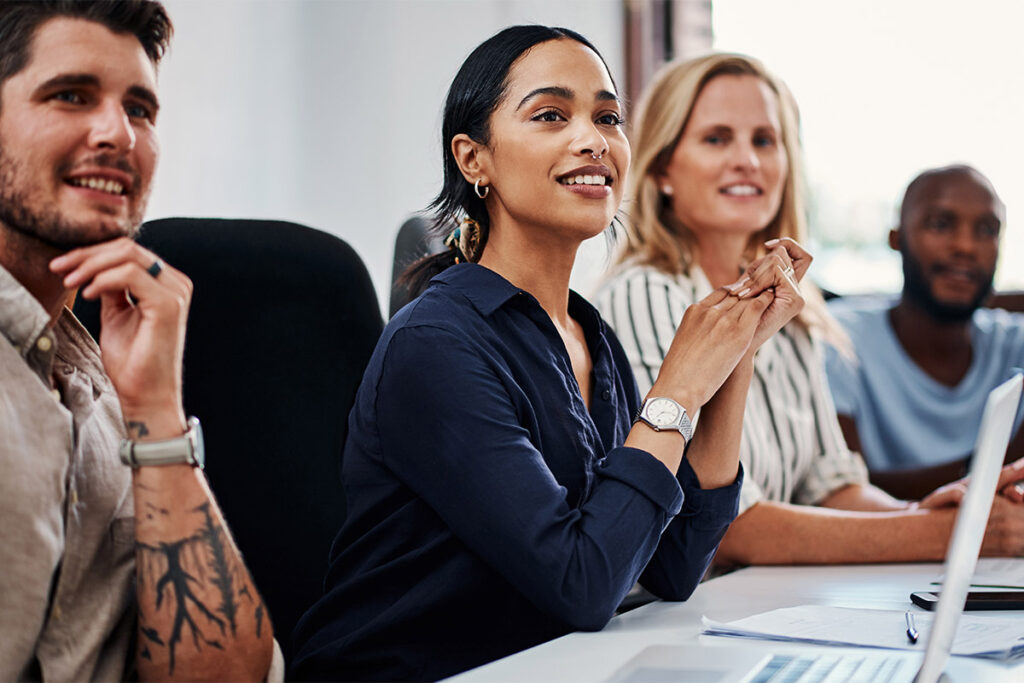 Participants actively engaged in a professional workshop and group discussion